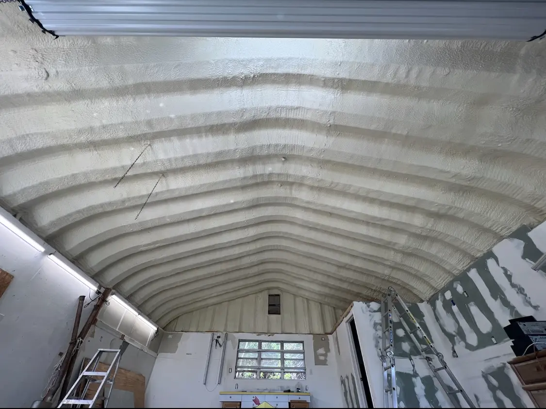 Spray polyurethane foam applied to the underside of a metal roof deck in Fair Lawn